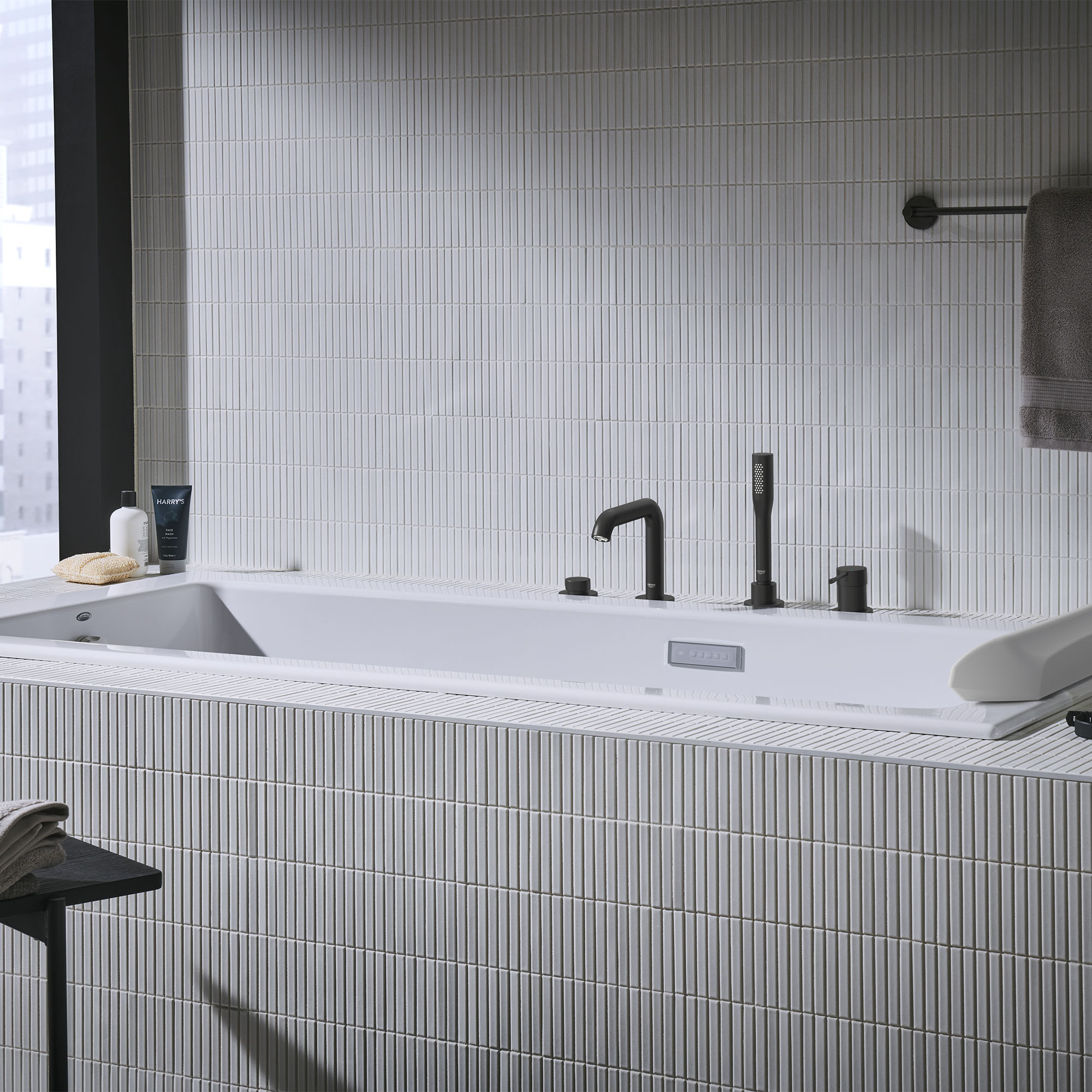 4-Hole Single-Handle Deck Mount Roman Tub Faucet with 1.75 GPM Hand Shower